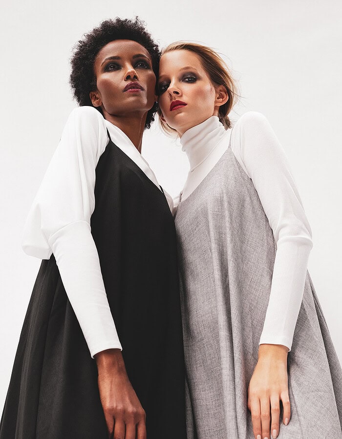 Fashion models in stylish monochrome outfits posing together. photographer NYC